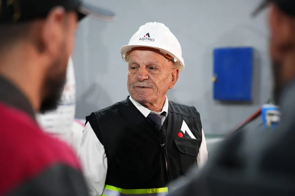 Astro Cables team leader wearing safety gear in the factory.